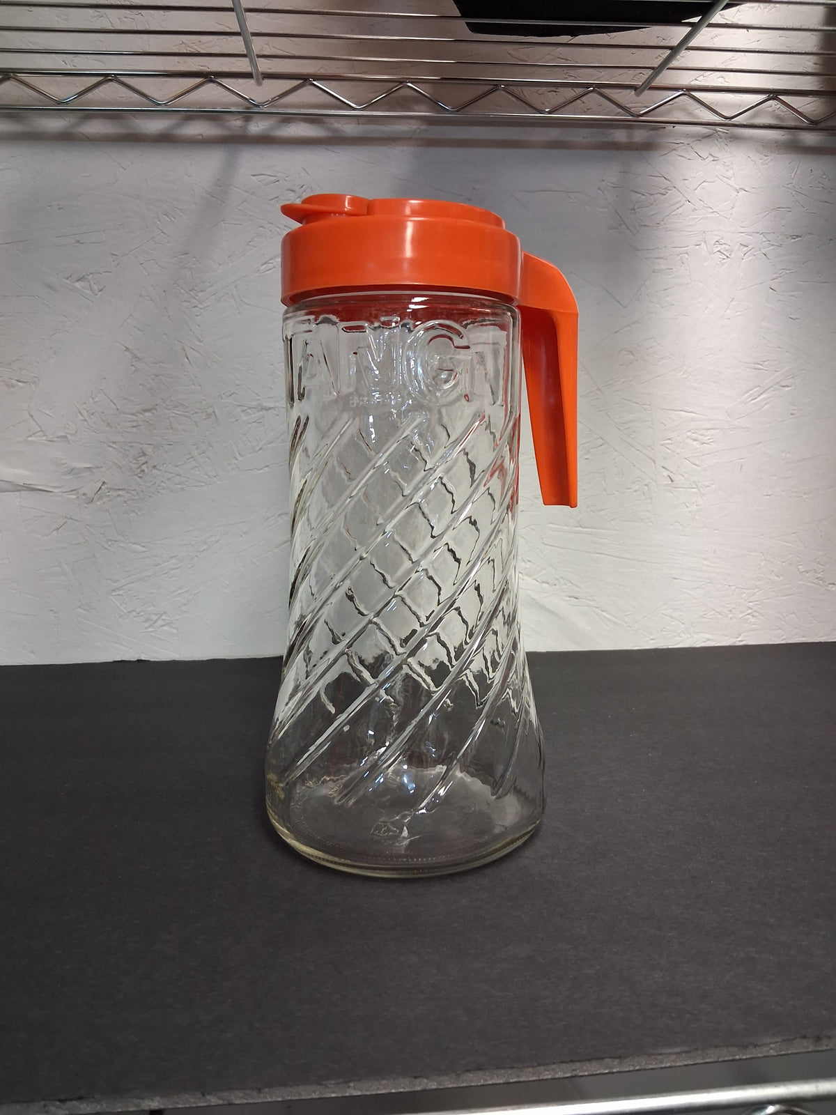 Vintage tang pitcher