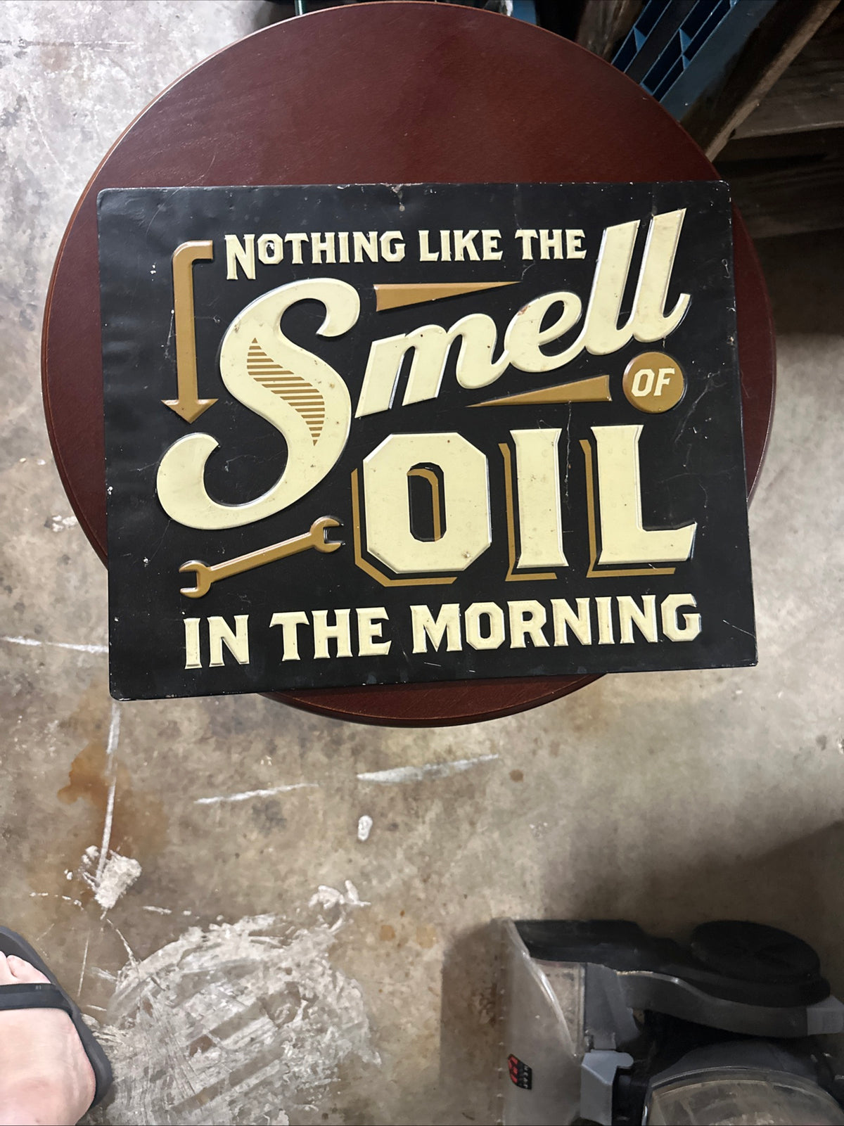 “Smell of oil” Sign