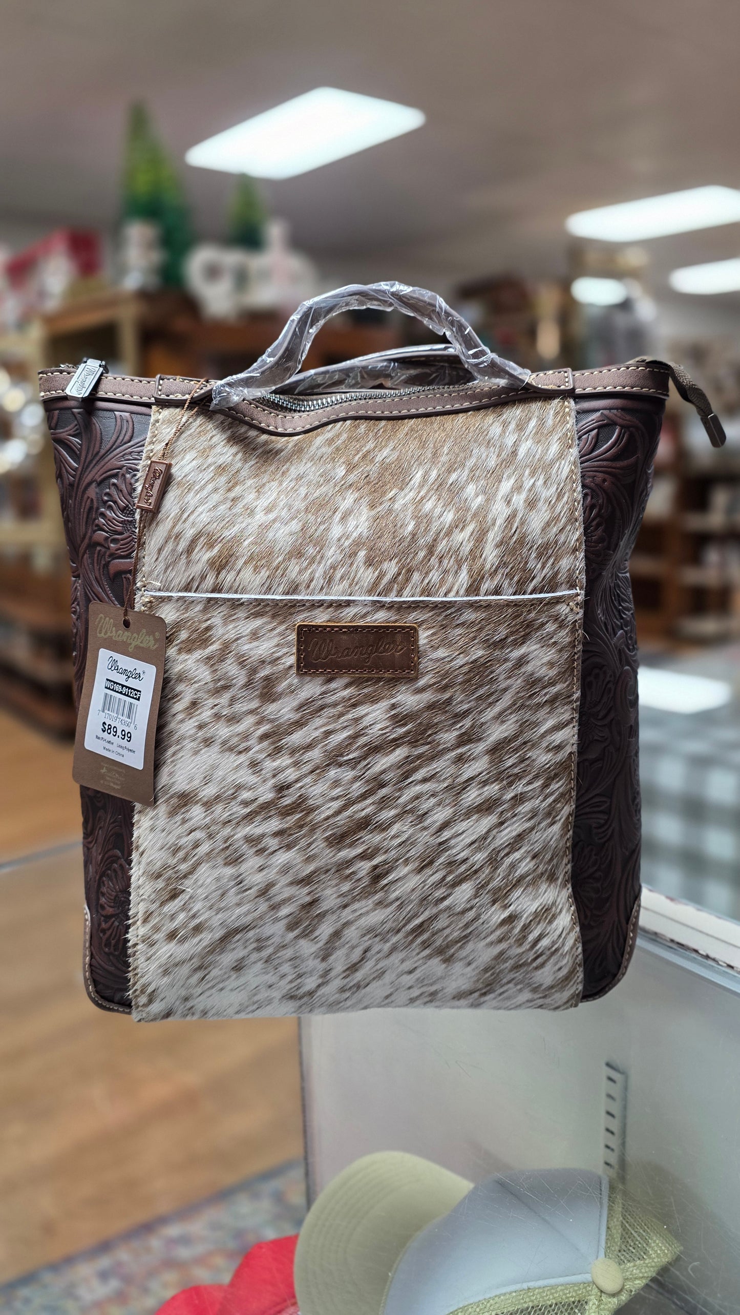 Wrangler Genuine Hair-On Cowhide Floral Tooled Convertible Backpack / Crossbody
