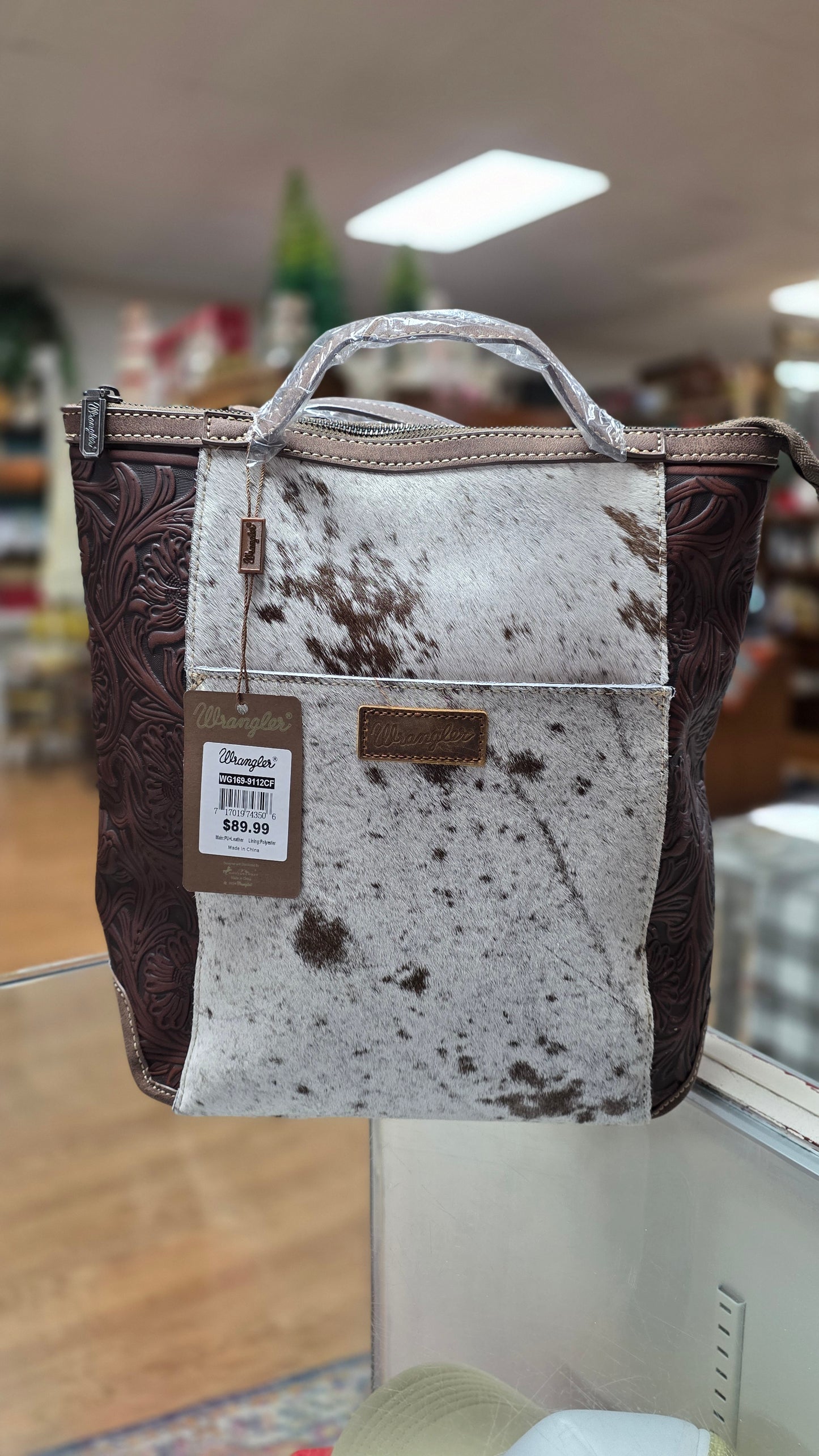 Wrangler Genuine Hair-On Cowhide Floral Tooled Convertible Backpack / Crossbody