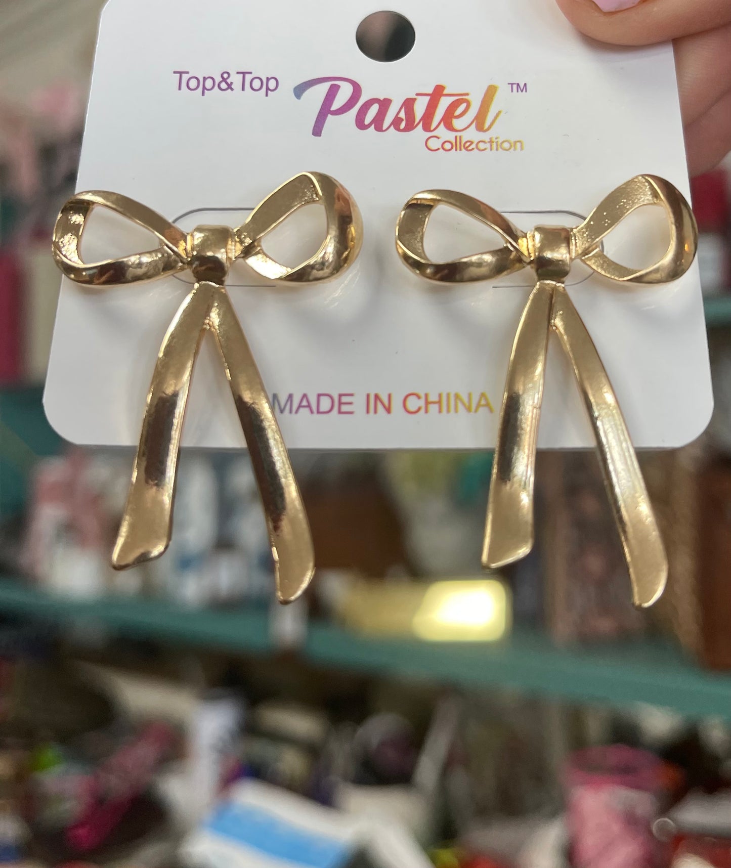 Long Bow Gold Earrings