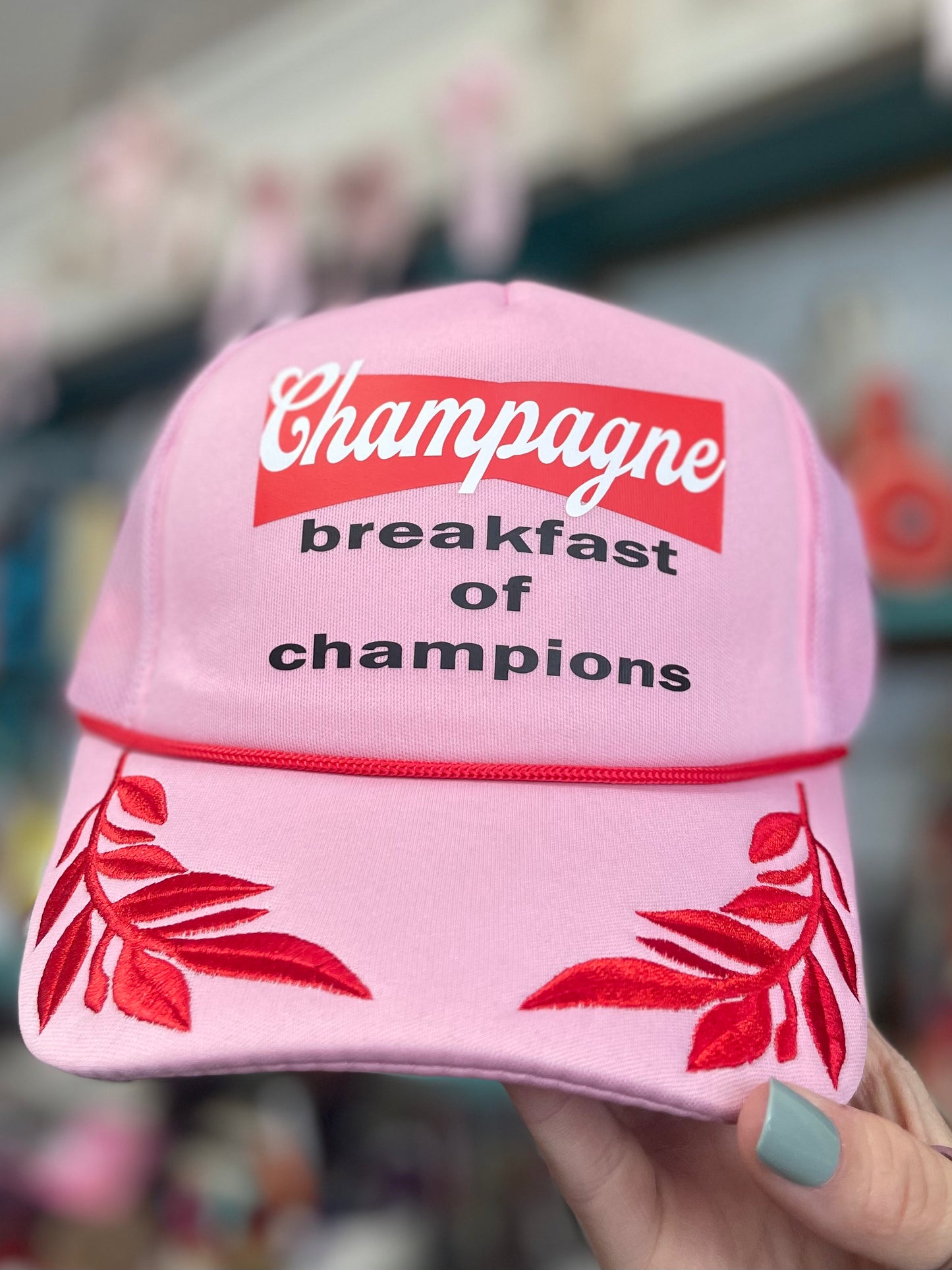 Champagne- breakfast of champions Adjustable Trucker Hat