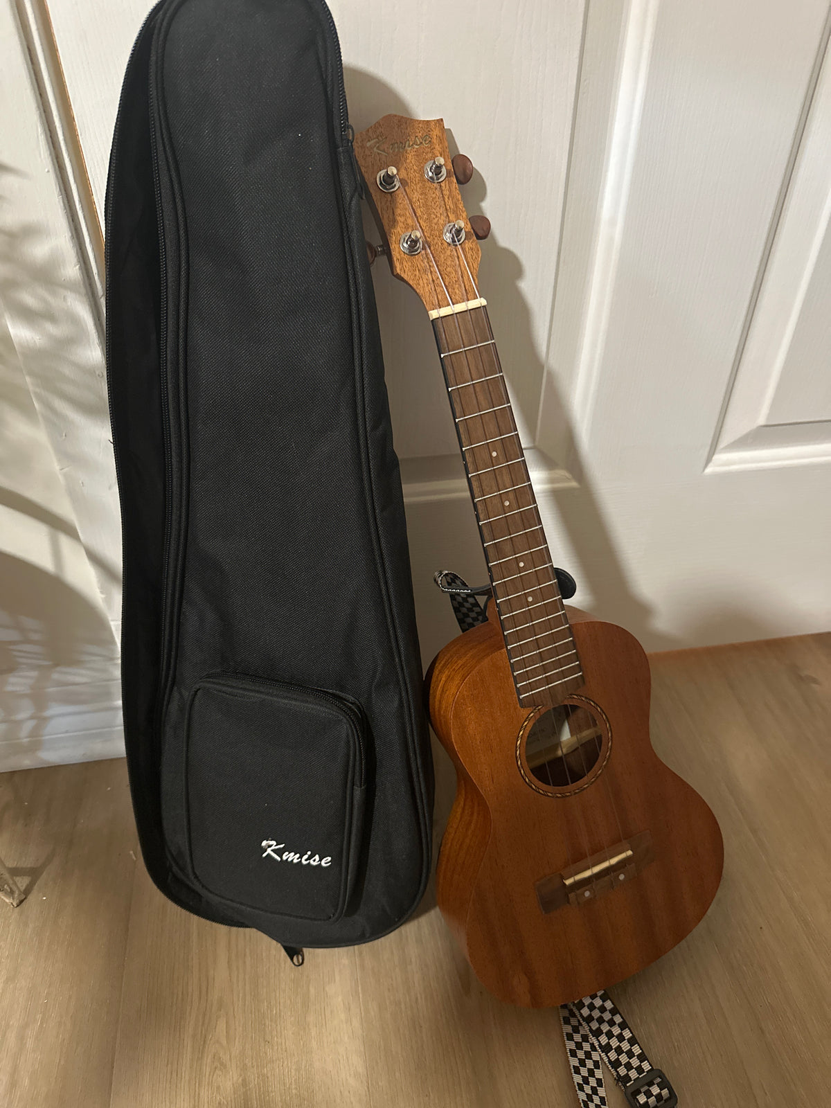 Kmise Ukulele 23” in case.