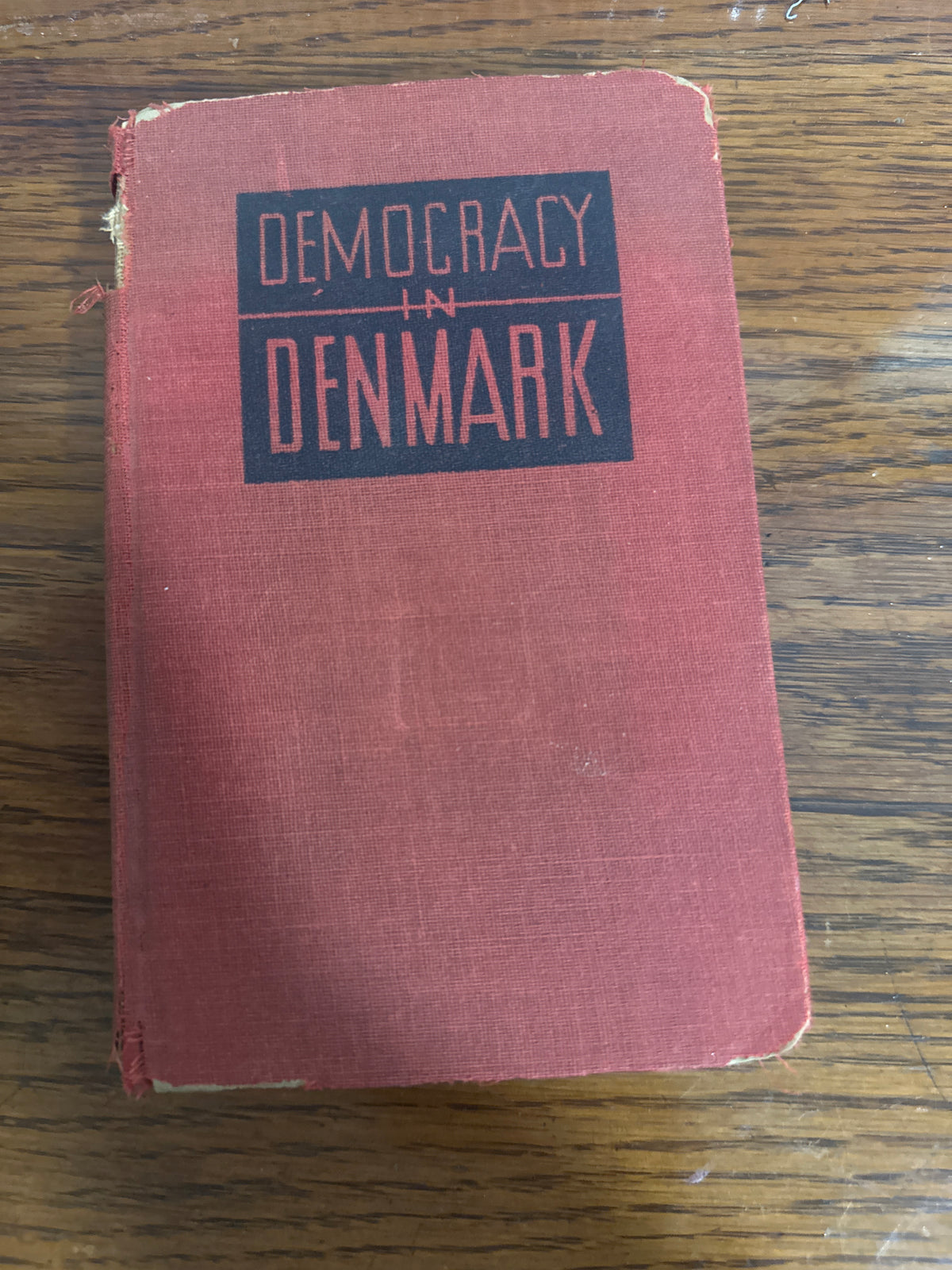Democracy in Denmark. Old red book